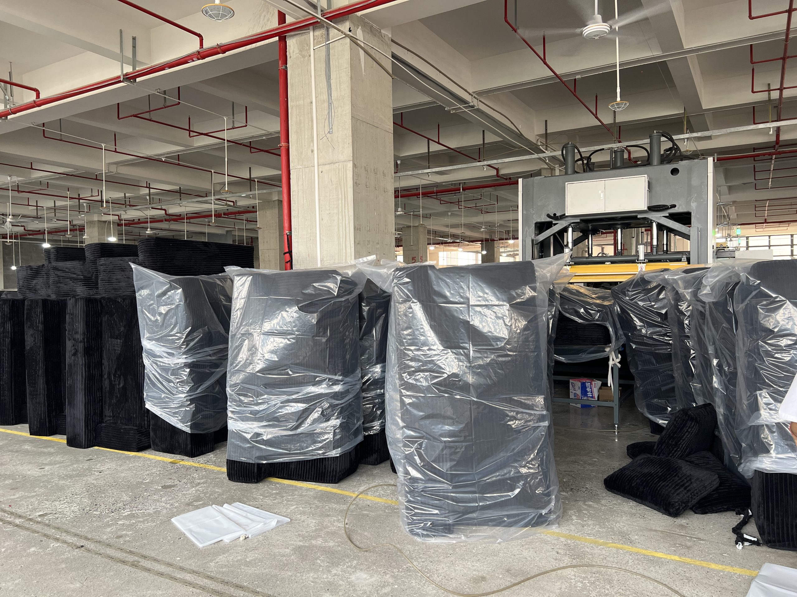 Compressed sofa manufacturing at QIANTONG factory